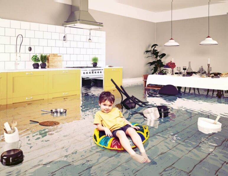 Boy in flooded room