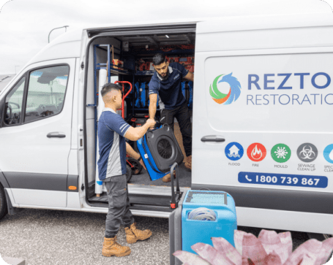 technicians loading van